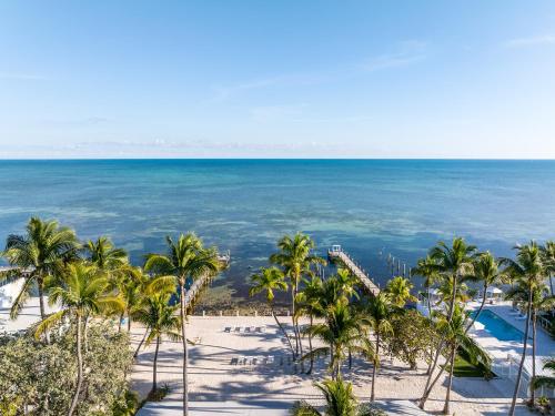 an aerial view of the beach and the ocean at Pines & Palms Resort in Islamorada