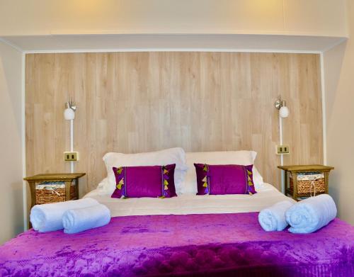 Postel nebo postele na pokoji v ubytování Departamentos Patagonia