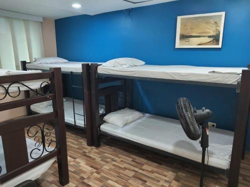 Postel nebo postele na pokoji v ubytování Hostal Avanza