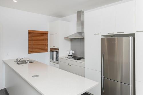 Η κουζίνα ή μικρή κουζίνα στο Modern Apartment in Gisborne CBD