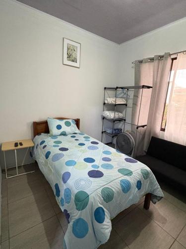 Ένα ή περισσότερα κρεβάτια σε δωμάτιο στο Schultz Apartamento