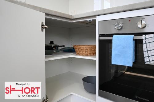 Una cocina o zona de cocina en Conservatorium Villa 3