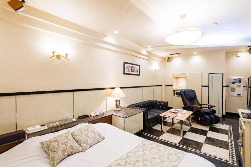 Postel nebo postele na pokoji v ubytování パティオアネックス -大人専用-