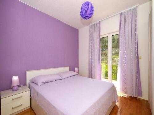 Postel nebo postele na pokoji v ubytování Apartments with parking spaces Arbanija, Ciovo - 5228