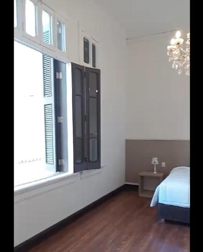 เตียงในห้องที่ Colville Hospedaje, a 1 cuadra de la plaza mayor de lima