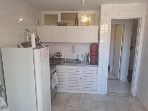 Η κουζίνα ή μικρή κουζίνα στο Beautiful ap in the heart of carnival