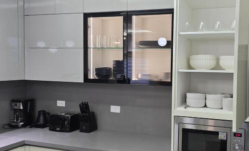 Una cocina o zona de cocina en Elite Escape at Paradisiac Beach Club