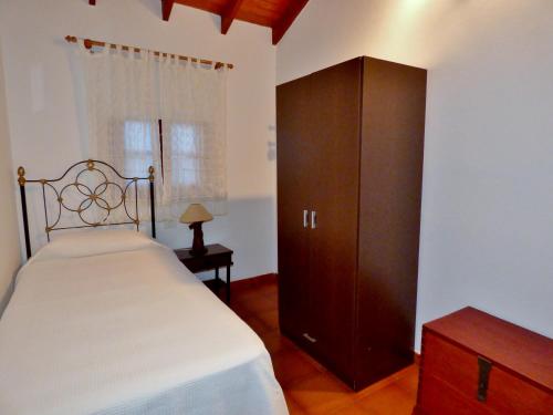Postel nebo postele na pokoji v ubytování Casa Guinea