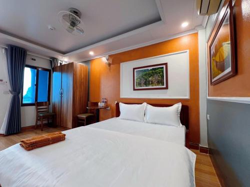 Ένα ή περισσότερα κρεβάτια σε δωμάτιο στο The Hive Hostel - Tam Coc