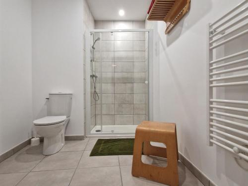 a bathroom with a shower and a toilet and a sink at Studio neuf avec terrasse au cœur de Le Palais - FR-1-418-260 in Le Palais