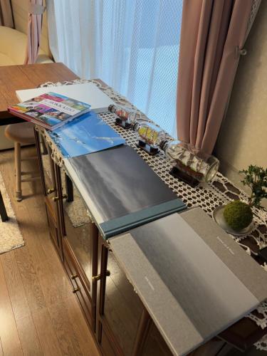 a table with a toy train on top of it at シマエナガニセコ in Kutchan