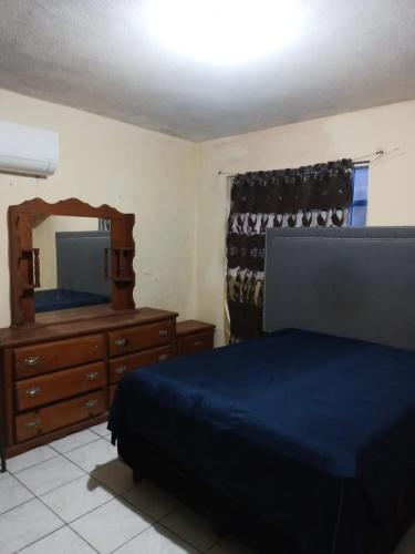 Ένα ή περισσότερα κρεβάτια σε δωμάτιο στο Casa Guaymas