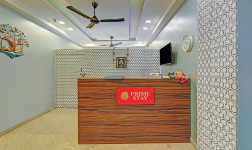an office with a private sign on a wooden door at Itsy Hotels Prime Stay in New Delhi