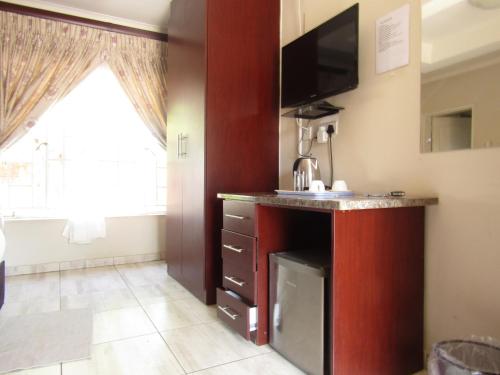 Una cocina o zona de cocina en Haithoms Guesthouse