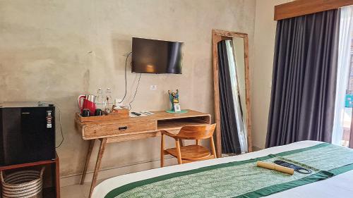 Postel nebo postele na pokoji v ubytování Arumasta Ubud