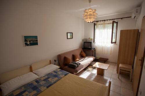 Posteľ alebo postele v izbe v ubytovaní Apartment Rakić Pomer