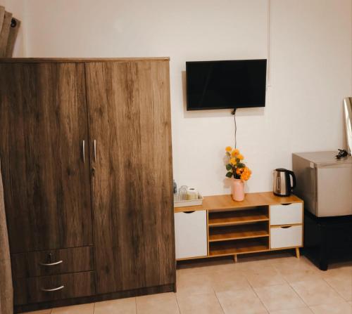 TV a/nebo společenská místnost v ubytování Fora Boutique Hotel