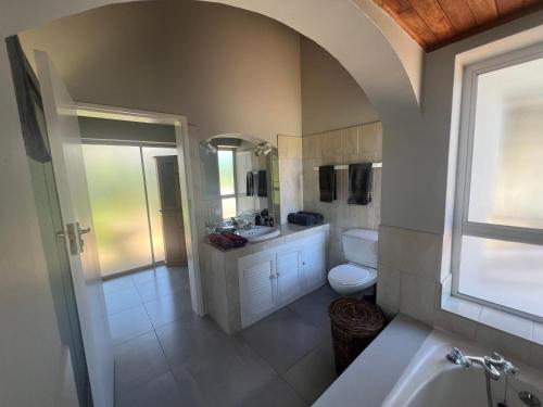 Koupelna v ubytování Leisure Escape Cottage - Knysna