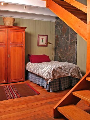 Ένα ή περισσότερα κρεβάτια σε δωμάτιο στο Hostería La Casa de Eugenia