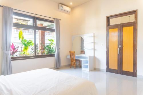 Кровать или кровати в номере Dani Private Villa - 2BR Private Pool Villa in Tejakula North Bali