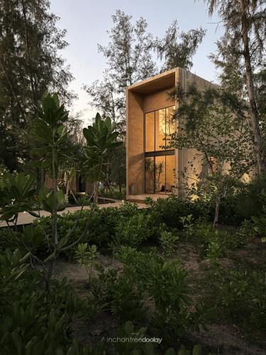 a house in the middle of a forest at inchantreedoolay huahin in Pran Buri