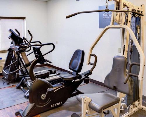 a gym with a treadmill and a exercise bike at Comfort Suites Omaha Northwest in Omaha