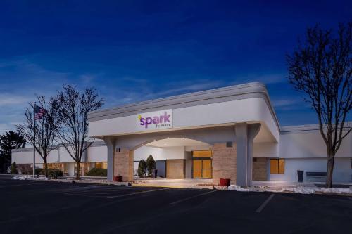 a spartacus store front with a sign on it at Spark By Hilton Bensalem Philadelphia in Bensalem