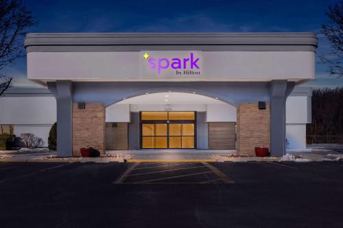 a spark building with a sign on top of it at Spark By Hilton Bensalem Philadelphia in Bensalem