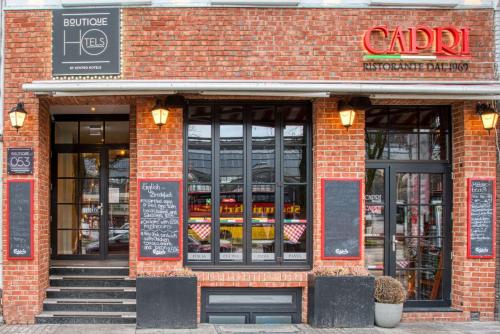 a store front of a brick building at Boutique 53 & 56 Hamburg City, Trademark Collection by Wyndham in Hamburg