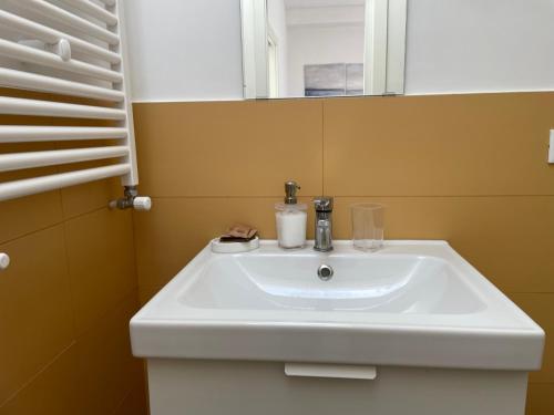 Ванная комната в Casa sul mare con accesso diretto in spiaggia II