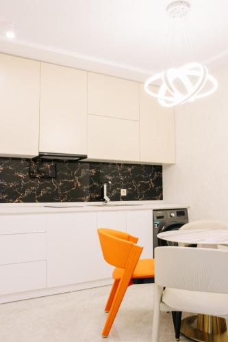 Η κουζίνα ή μικρή κουζίνα στο Design Hotel "Mamu Apartment" with kitchen and mountain views