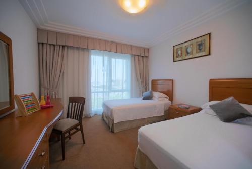 Katil atau katil-katil dalam bilik di Grand Hyatt Residence