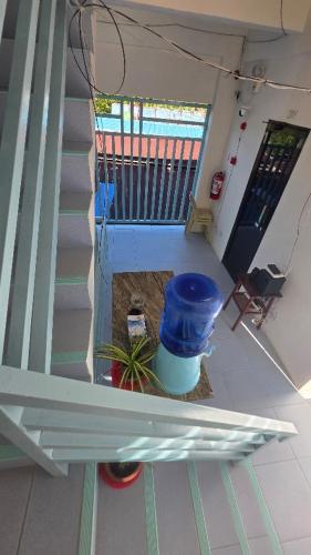 a view of a stairway with a blue container at Villa Juan y Exequila in Anda