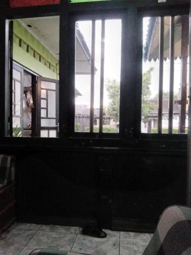Ein Sitzbereich in der Unterkunft Surya Wijaya Homestay