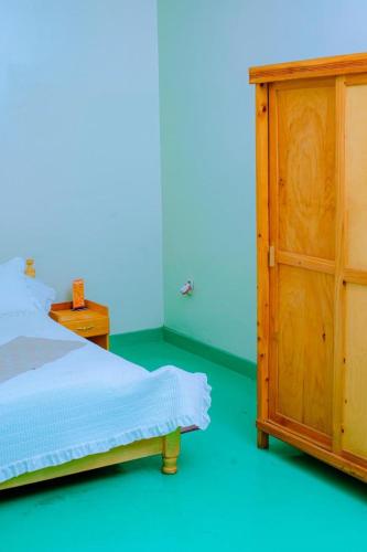 Ένα ή περισσότερα κρεβάτια σε δωμάτιο στο Quality Inn Motel Nyanza