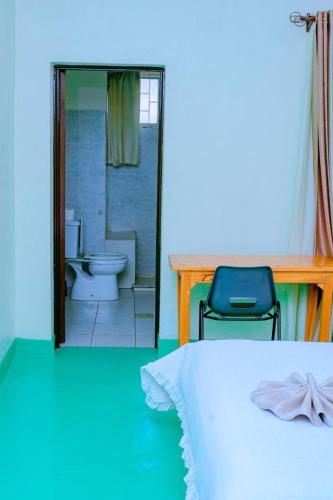 Ένα ή περισσότερα κρεβάτια σε δωμάτιο στο Quality Inn Motel Nyanza