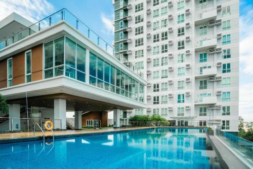 Bazén v ubytování Davao Central Suites nebo v jeho okolí