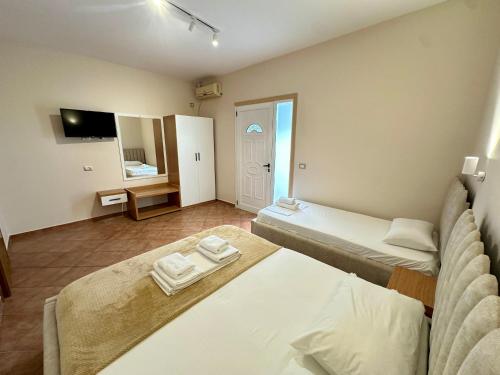 Postel nebo postele na pokoji v ubytování Anel Studios