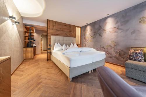 Cama o camas de una habitación en Hotel Berghof Mayrhofen GmbH