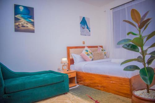 Postel nebo postele na pokoji v ubytování Saffron Homes