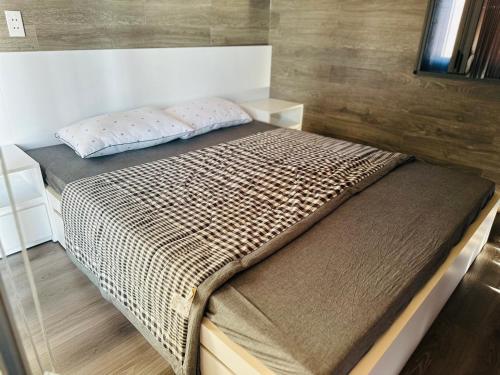 Voodi või voodid majutusasutuse Nhà của gió - Sông SêrêPốk toas