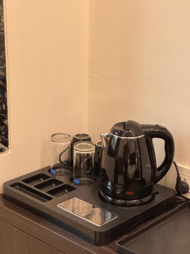 Kaffee-/Teezubehör in der Unterkunft The Visawa Resort Badlapur