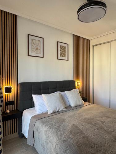 Postel nebo postele na pokoji v ubytování Aparthotel Costa Blanca