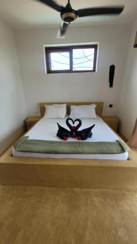 Ein Bett oder Betten in einem Zimmer der Unterkunft Iaia apartments