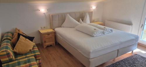 Ein Bett oder Betten in einem Zimmer der Unterkunft Mutmanör