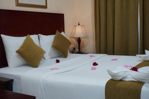 Katil atau katil-katil dalam bilik di Onyx Hotel Apartments - MAHA HOSPITALITY GROUP