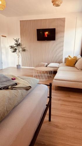TV a/nebo společenská místnost v ubytování Apartment mit Netflix - Parken - Küche - Bad