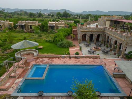 an overhead view of a swimming pool in a yard at Little Affair in Tehla