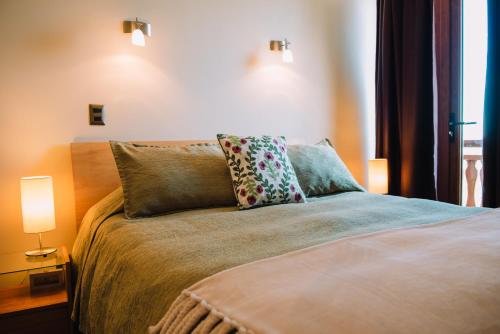 Hotel Chalet Vallugaにあるベッド
