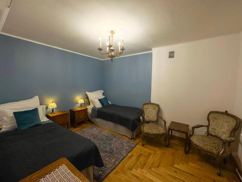Katil atau katil-katil dalam bilik di Apartament Przy Rynku Wielkim
